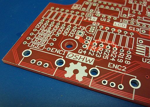 An Open Source Hardware (OSHW) logo proudly displayed on the silkscreen of a blank project PCB, the uSupply by EEVblog
